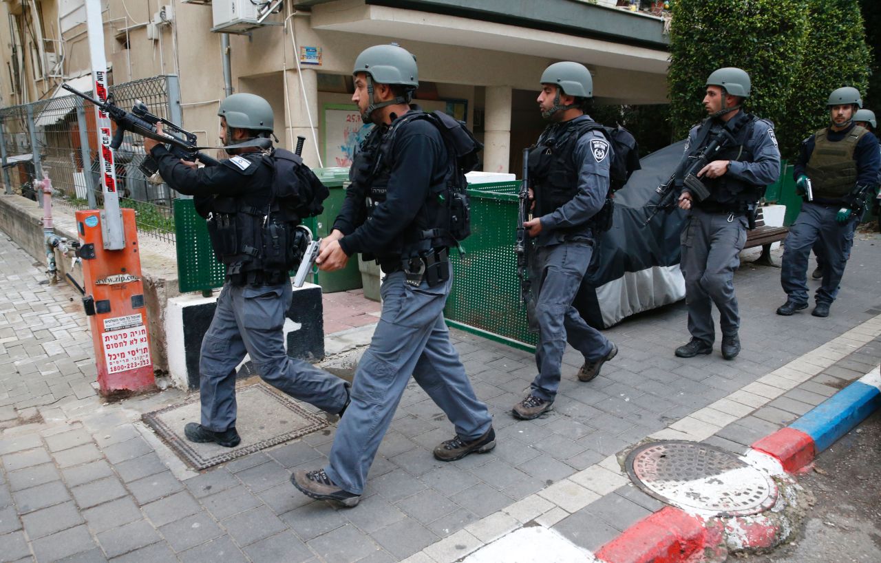 Security forces patrol the area after the shooting.