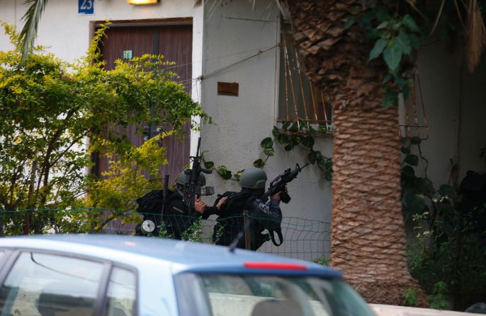 Israeli security forces search for the suspect.