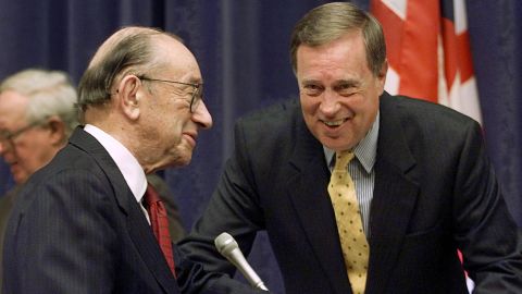 U,S. Federal Reserve Chairman Alan Greenspan (L) chats with then House Financial Services Committee Chairman Michael Oxley (R), R-OH, before testifying in front of that committee 28 February, 2001 on Capitol Hill in Washington, DC.
