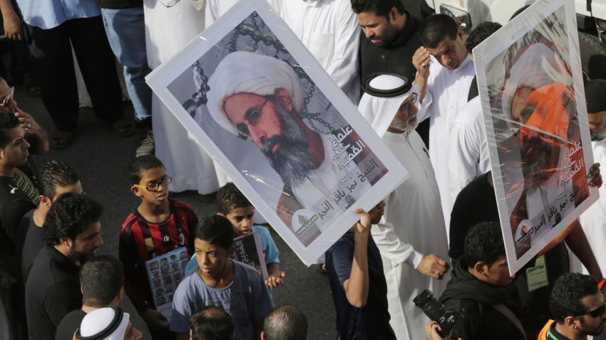 In this Saturday, May 30, 2015, photo, Saudis carry a poster demanding freedom for jailed Shiite cleric Sheikh Nimr al-Nimr, during a funeral procession, in Tarut, Saudi Arabia. Saudi Arabia says it has executed 47 prisoners, including leading Shiite cleric Sheikh Nimr al-Nimr. The clerics name was among a list of the 47 prisoners executed carried by the state-run Saudi Press Agency. It cited the Interior Ministry for the information.  (AP Photo/Hasan Jamali)