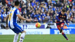 Barcelona's Argentinian forward Lionel Messi takes a free kick during the Spanish league football match RCD Espanyol vs FC Barcelona at the Power8 stadium in Cornella de Llobregat on January 2, 2016.