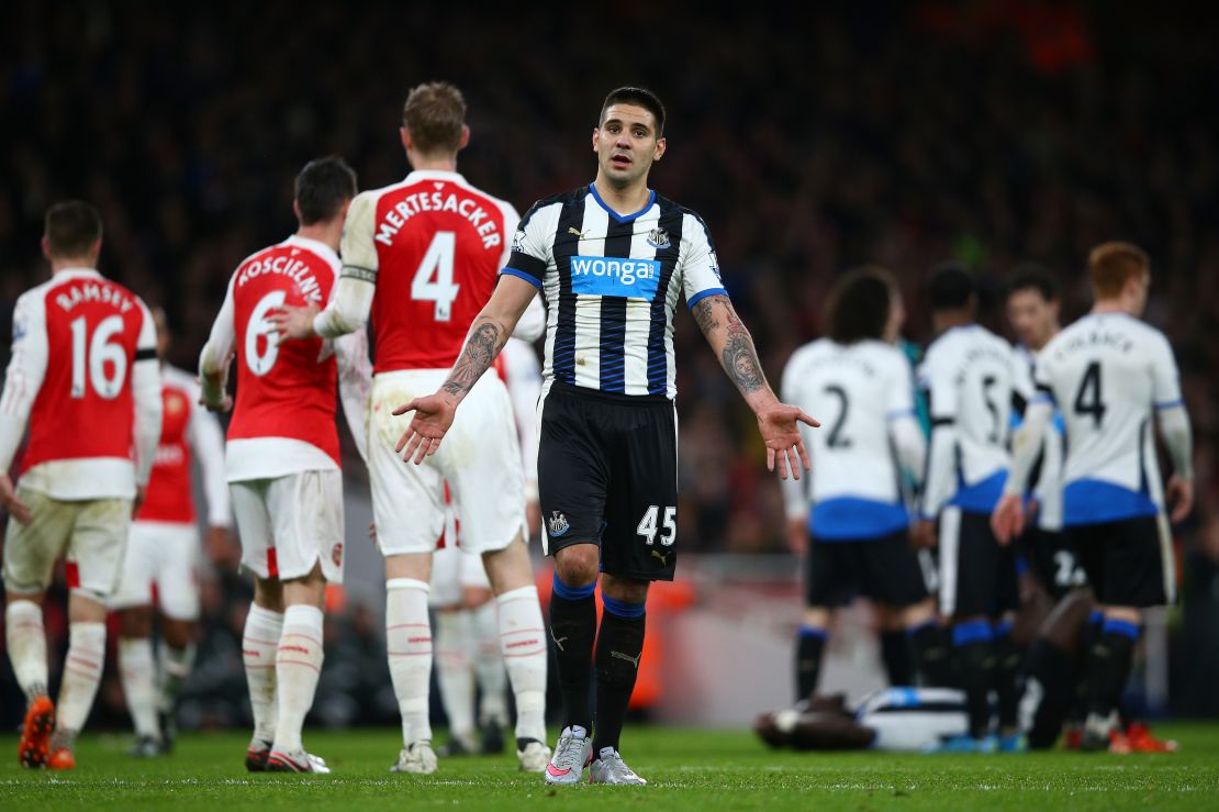 Aleksandar Mitrovic of Newcastle reacts to a missed chance against Arsenal.