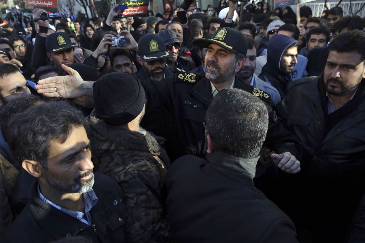 Tehran's police chief Gen. Hossein Sajedinia, center right, tries to disperse protesters in front of Saudi Arabia's Embassy in Tehran on January 3.