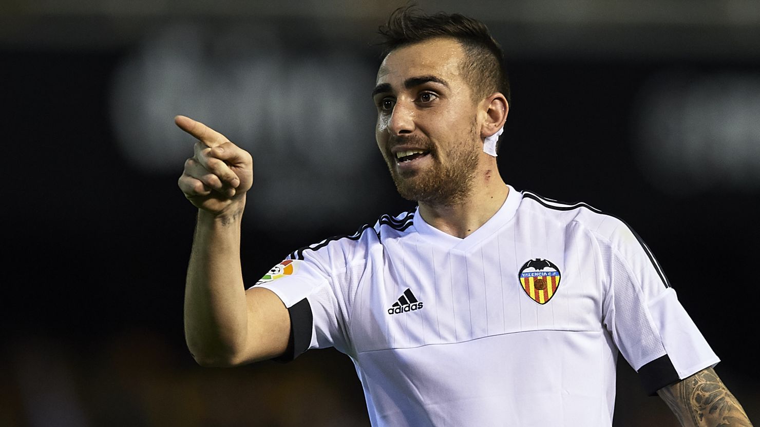 Paco Alcacer of Valencia celebrates his side's late equalizer in the 2-2 draw with Real Madrid in the Mestella.

