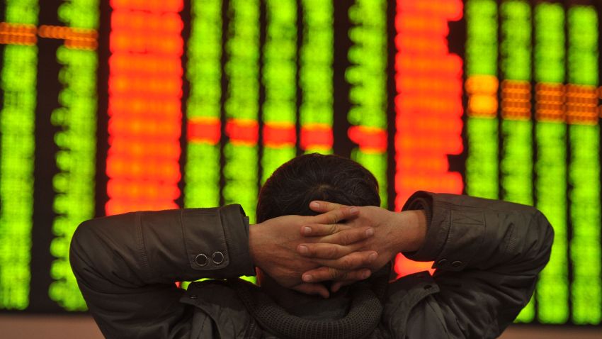 An investor sits in front of a screen showing stock market movements in a stock firm in Fuyang, east China's Anhui province on January 4, 2016. Trading on the Shanghai and Shenzhen stock exchanges was ended early on January 4 after shares fell seven percent, the first time China's new "circuit breaker" intervened to curb market volatility.        AFP PHOTO   CHINA OUTSTR/AFP/Getty Images