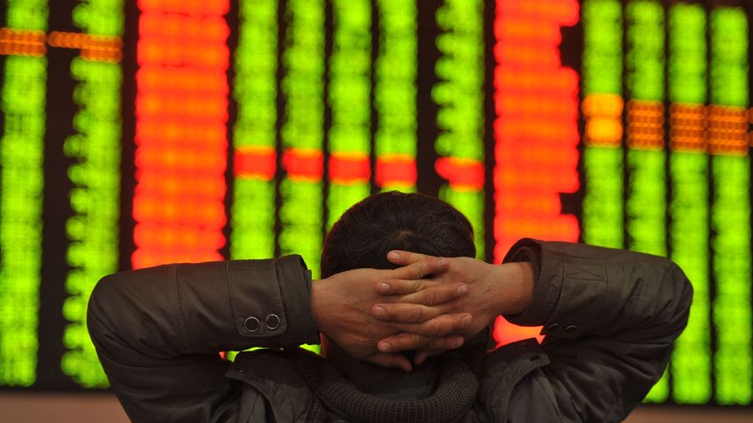 An investor sits in front of a screen showing stock market movements in a stock firm in Fuyang, east China's Anhui province on January 4, 2016. Trading on the Shanghai and Shenzhen stock exchanges was ended early on January 4 after shares fell seven percent, the first time China's new "circuit breaker" intervened to curb market volatility. AFP PHOTO CHINA OUTSTR/AFP/Getty Images