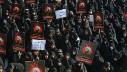 Iranian women attend a rally to protest the execution by Saudi Arabia last week of Sheikh Nimr al-Nimr, a prominent opposition Shiite cleric, shown in the posters, in Tehran, Iran, Monday, Jan. 4, 2016. Allies of Saudi Arabia followed the kingdom's lead and began scaling back diplomatic ties to Iran on Monday after the ransacking of Saudi diplomatic missions in the Islamic Republic, violence sparked by the Saudi execution of al-Nimr. (AP Photo/Vahid Salemi)