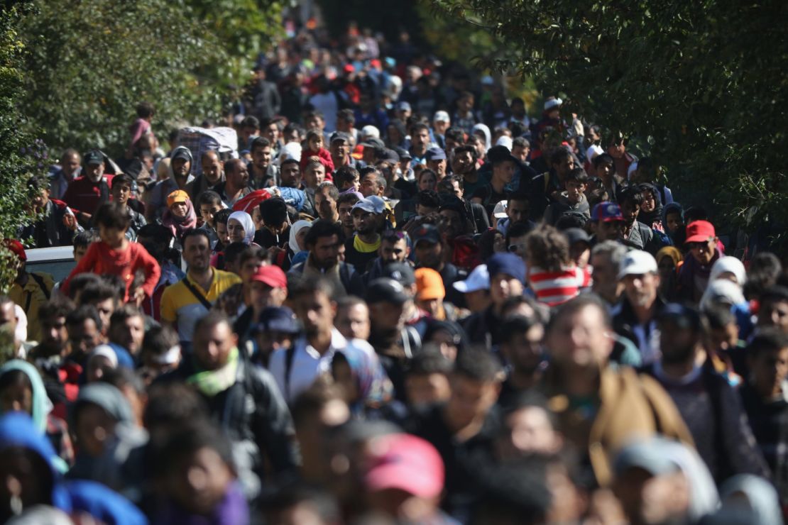 Hundreds of migrants walk into Austria on September 22.
 