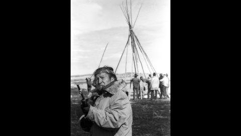 Oscar Bear Runner stands guard as members of the American Indian Movement set up a tepee south of Wounded Knee, South Dakota, on March 3, 1973.