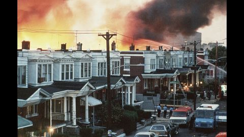 Flames shoot up skyward at the MOVE compound in West Philadelphia, Pennsylvania, on May 14, 1985.