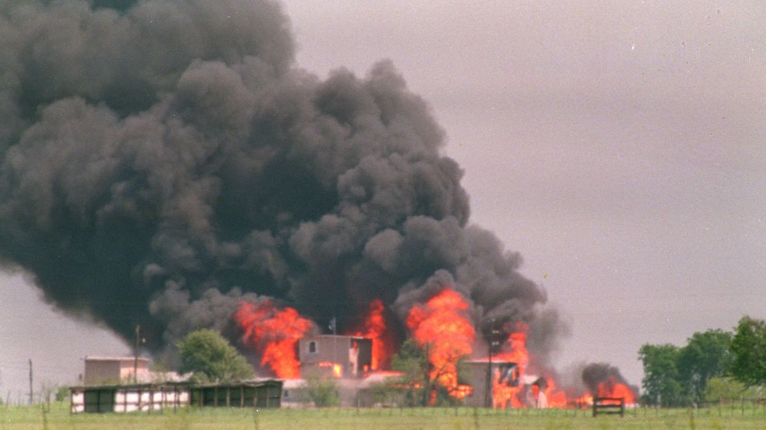Flames engulf the Branch Davidian compound in Waco, Texas, on April 19, 1993.  
