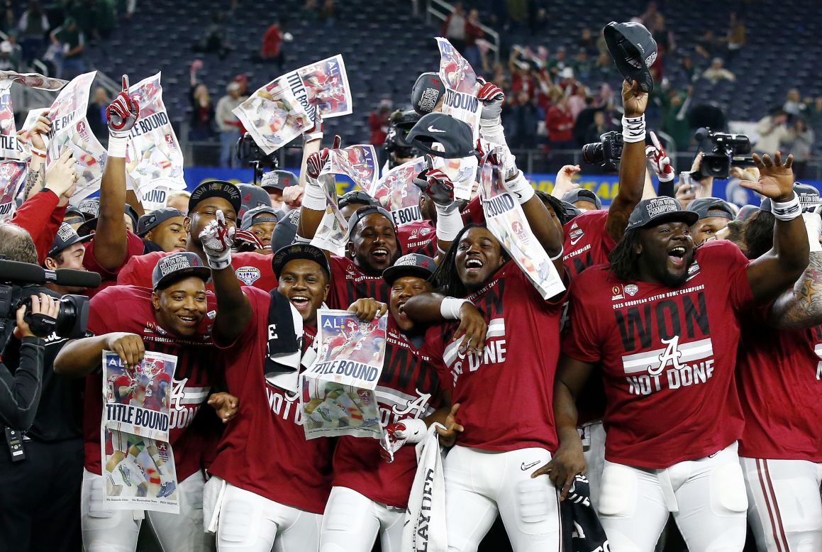 Alabama football players celebrate after they shut out Michigan State 38-0 in the Cotton Bowl on Thursday, December 31.