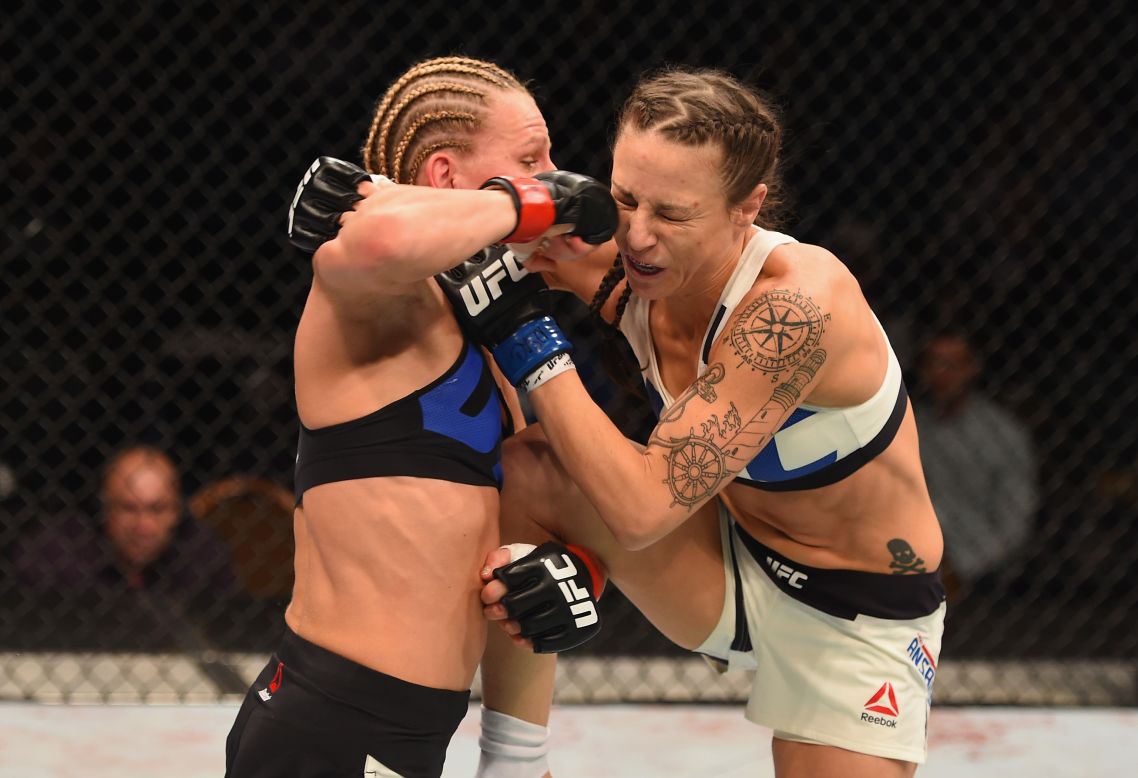 Justine Kish, left, punches Nina Ansaroff during a UFC bout in Las Vegas on Saturday, January 2. Kish won the fight by unanimous decision.