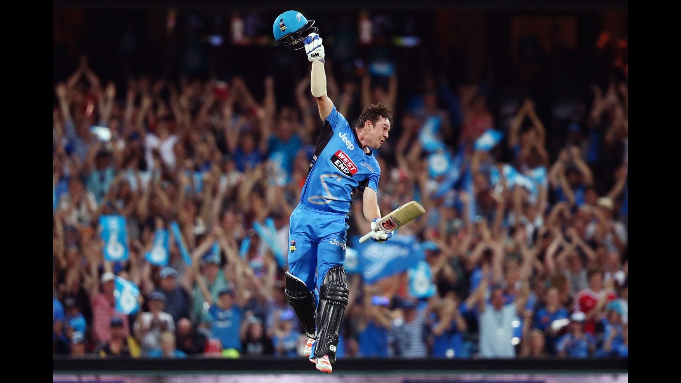 Adelaide's Travis Head celebrates after hitting the winning runs against the Sydney Sixers on Thursday, December 31. Head scored a century in the Big Bash League match.