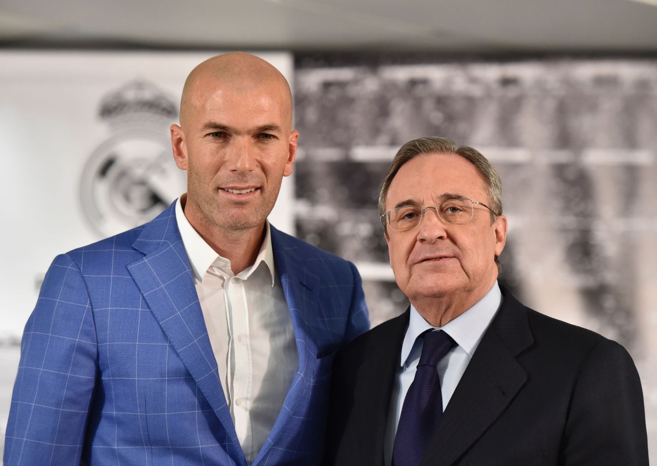 Zinedine Zidane (L) poses with Real Madrid's president Florentino Perez on Monday. The Frenchman becomes the 11th coach to serve under Perez.  