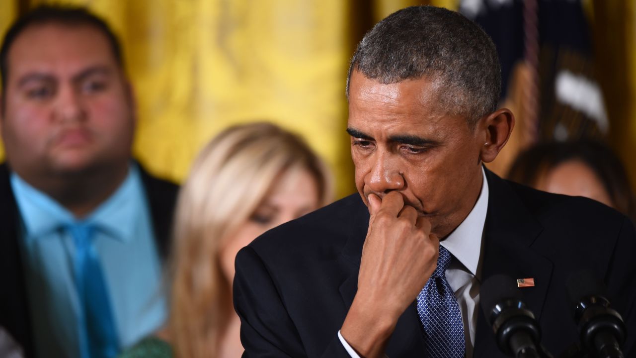 US President Barack Obama becomes emotional as he delivers a statement on executive orders to reduce gun violence on January 5, 2016 at the White House in Washington, DC. AFP PHOTO/JIM WATSON / AFP / NICHOLAS KAMM