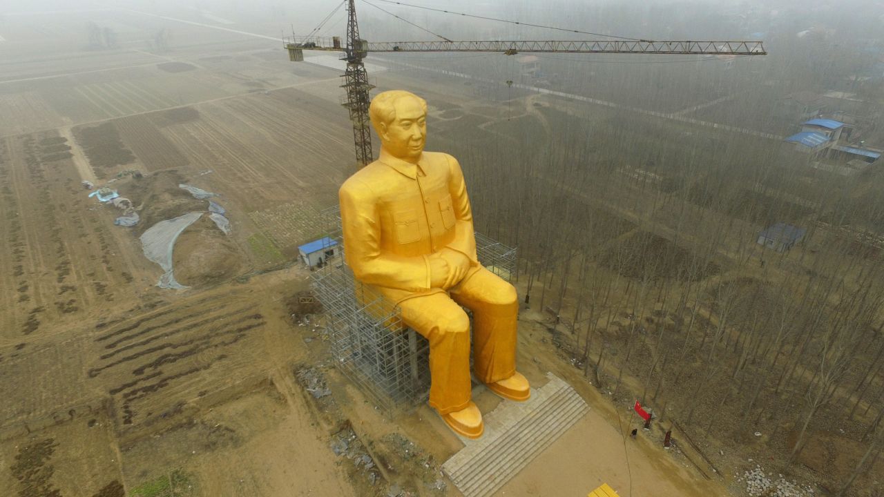 TONGXU, CHINA - JANUARY 04:  (CHINA OUT) A huge statue of Chairman Mao Zedong, 36.6 meters in height, is under construction at Zhushigang village on January 4, 2016 in Tongxu County, China. The statue costs nearly 3 million yuan (459,300 USD) donated by several entrepreneurs and some villagers in Zhushigang village.  (Photo by ChinaFotoPress/ChinaFotoPress via Getty Images)