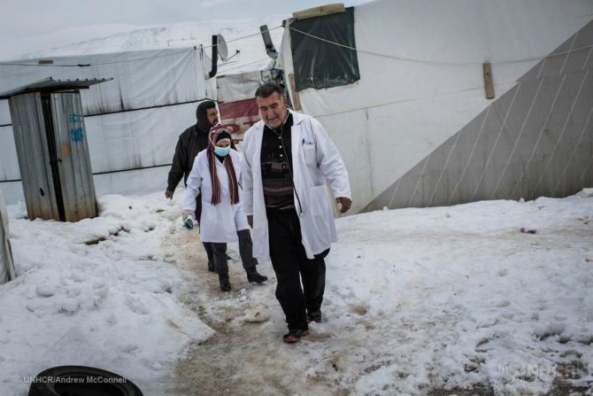 Researchers at the London School of Hygiene and Tropical Medicine are trialling a form of informal humanitarian assistance through a network of skilled refugee informants providing basic primary care and conduct health assessments ready to inform Lebanese health teams when they visit. Pictured, a doctor and nurse visit a family in Dilhamye tented settlement in Bekaa Valley, Lebanon.