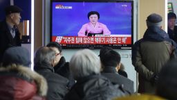 People watch a TV news program showing North Korea's announcement, at the Seoul Railway Station in Seoul, South Korea, Wednesday, Jan. 6, 2016. North Korea said Wednesday it had conducted a hydrogen bomb test, a defiant and surprising move that, if confirmed, would put Pyongyang a big step closer toward improving its still-limited nuclear arsenal. The letters read " Will not use nuclear weapon if autonomy secured."  (AP Photo/Ahn Young-joon)