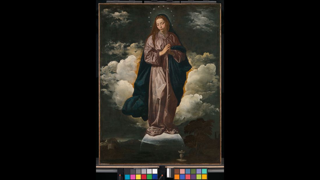 In this unusual image, Velazquez, who also painted a companion piece entitled St John the Evangelist on the Island of Patmos, depicts the Woman Clothed with the Sun of Revelation 12 as the Virgin Mary, echoing an interpretative trend that had existed since the 5th century. In the foreground is a fountain, perhaps intended to symbolize the "river of the water of life" of the New Jerusalem of Rev. 21-22, thus implying that the two paintings taken together were intended as an unusual synthesis of the entirety of the Book of Revelation.<br />