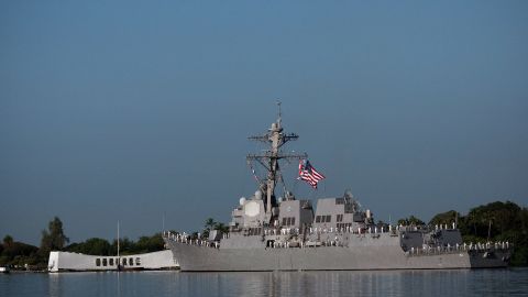 The USS Chafee does a Pass-in-review of the Arizona Memorial on the 69th anniversary of the attack on the U.S. naval base at Pearl Harbor on the island of Oahu on December 7, 2010.