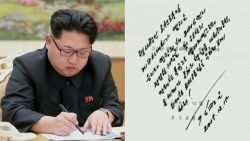 split Kim North Korea signs paper
