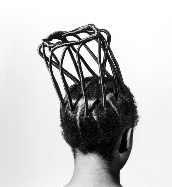 From the series "Hairstyles," Ojeikere's portfolio would be called "<a href="http://edition.cnn.com/2014/10/13/world/africa/a-love-letter-to-nigeria-ojeikere/">a love letter to Nigeria</a>" after his passing in 2014. A giant of the African photography scene, he was a keen documenter of contemporary culture. This anthropological series about Nigerian hairstyle went on to achieve iconic status.