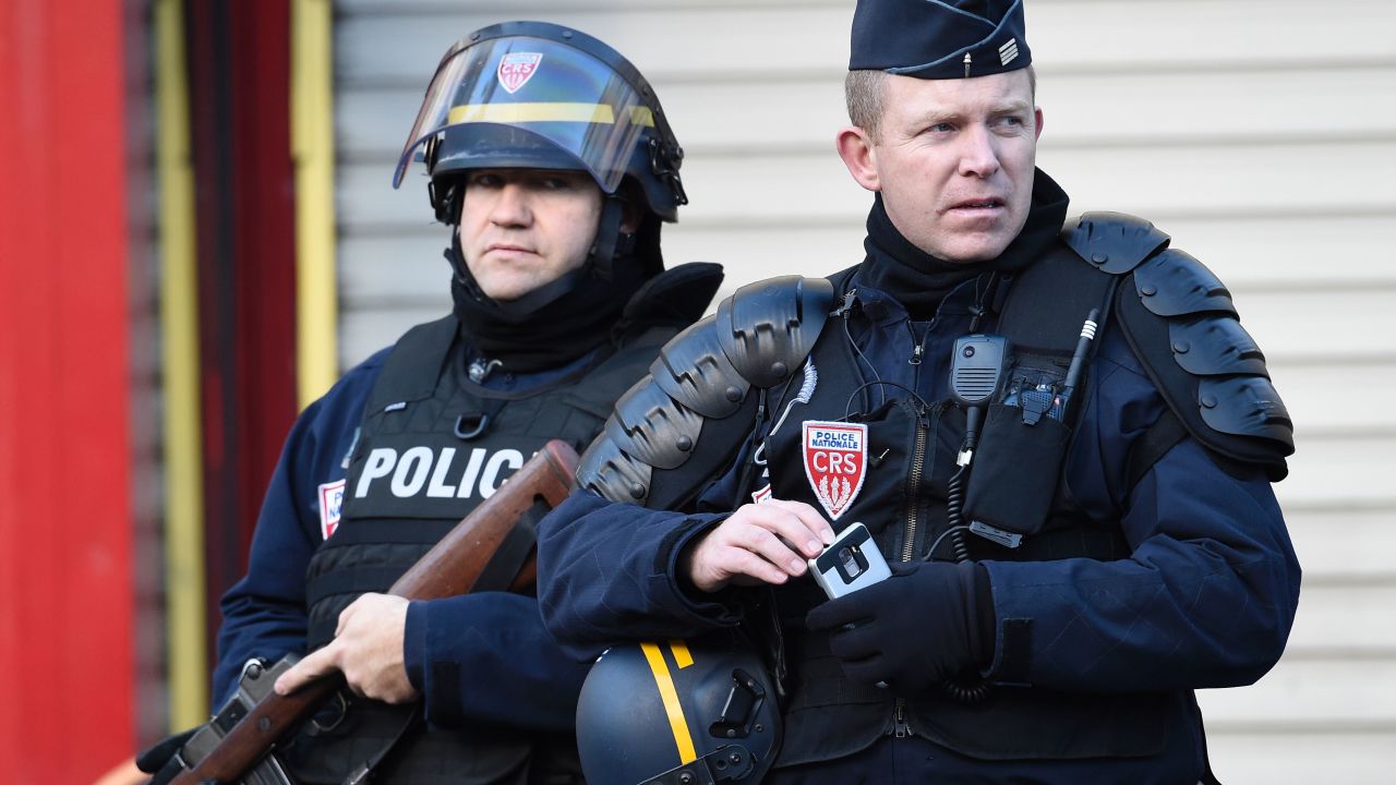 French police patrol near the Rue de la Goutte d'Or in the north of Paris on January 7, 2016, after police shot a man dead as he was trying to enter a police station. French police shot dead a suspected suicide bomber as he attacked the police station, a year to the day since jihadist gunmen killed 12 people at Charlie Hebdo newspaper. The man reportedly shouted "Allahu Akbar" (God is Greatest) and was carrying a knife and what turned out to be a 'fake' suicide vest. AFP PHOTO / LIONEL BONAVENTURE / AFP / LIONEL BONAVENTURE        (Photo credit should read LIONEL BONAVENTURE/AFP/Getty Images)