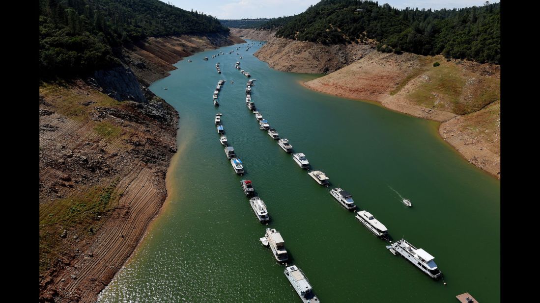 Houseboats are moored on a shrinking arm of the Oroville Lake reservoir as the ongoing drought, which is now in its fourth year, has left it at only one-quarter full. As much as 97% of the state of California ended 2015 in drought conditions and the critical Sierra snowpack measured as low as 5% of normal during the year. 