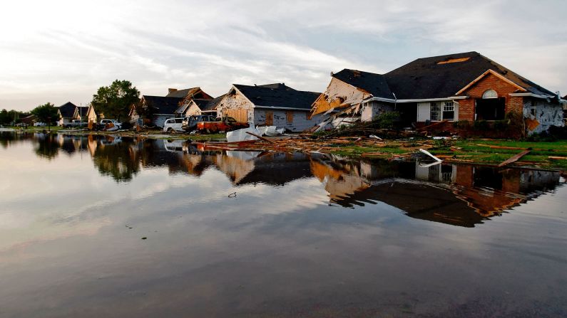 Water laps up to damaged homes in Coal City, Illinois, on June 24 a day after a tornado struck the area.  The tornado was part of a thunderstorm complex that spawned more than  1,200 reports of severe weather from the Midwest through the Northeast. These included strong winds, large hail, and as many as 40 tornadoes in a 48-hour period from June 21-23.<br />