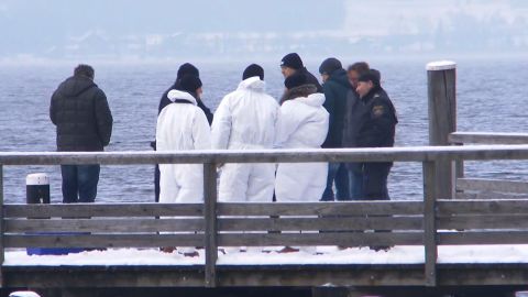 Investigators at Traunsee lake in Austria where the bodies were found.