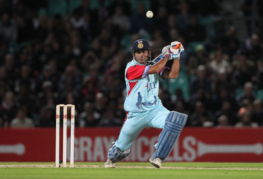 MS Dhoni smashes a boundary during a charity match at The Oval cricket ground in London last September. India's captain in limited-overs cricket said Pranav's incredible knock was "no joke." <br /><br />"Scoring 1,009 runs is not a joke. It's a tremendous effort and shows a glimpse of talent," Dhoni told reporters, AFP reported. 