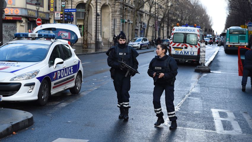 Armed French police women are seen at Barbes-Rochechouart in the north of Paris on January 7, 2016, after police shot a man dead as he was trying to enter a police station. A witness told AFP he had heard "two or three shots" in the incident that occurred a year to the day of the jihadist attack on satirical newspaper Charlie Hebdo.  AFP PHOTO / LIONEL BONAVENTURE / AFP / LIONEL BONAVENTURE        (Photo credit should read LIONEL BONAVENTURE/AFP/Getty Images)
