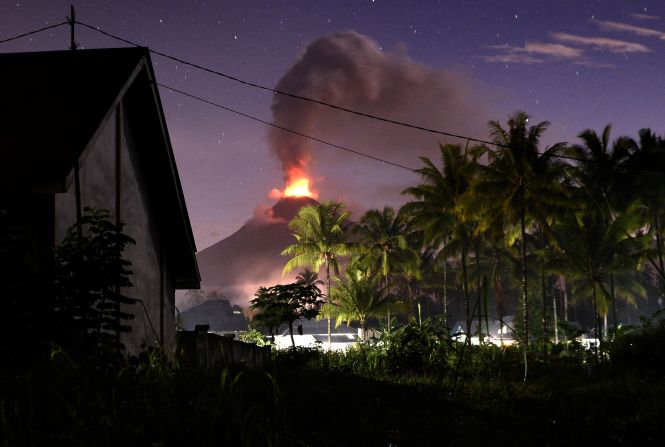 The Soputan volcano spews lava and ash during an eruption on Indonesia's Sulawesi island in January 2016.