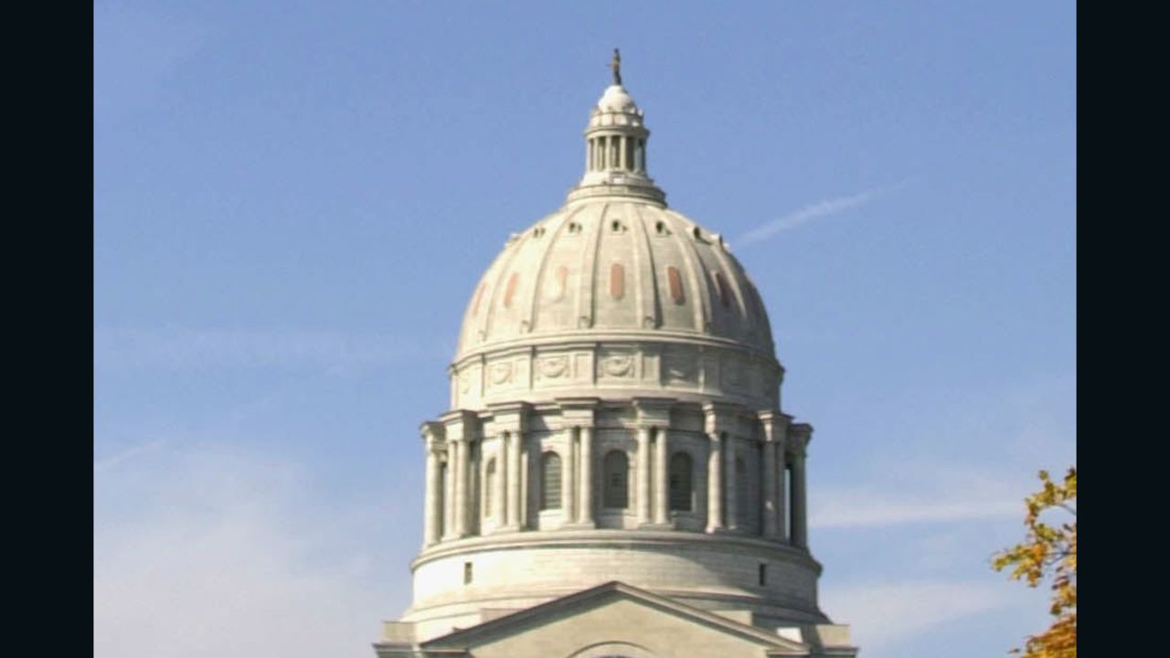 Military F-15's flyover the state capitol building in honor of Missouri Governor Mel Carnahan, following a memorial service 20 October, 2000, in Jefferson City, Missouri.