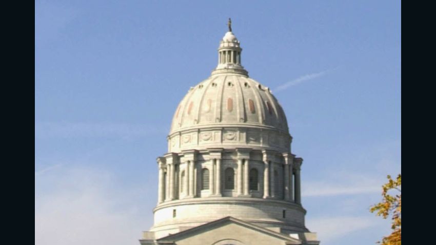 Military F-15's flyover the state capitol building in honor of Missouri Governor Mel Carnahan, following a memorial service 20 October, 2000, in Jefferson City, Missouri.