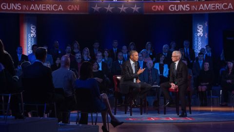 U.S. President Barack Obama speaks about guns at a town-hall meeting in Fairfax, Virginia, on Thursday, January 7. During the event, moderated by CNN's Anderson Cooper, Obama rejected the "imaginary fiction" that he wanted to take away the guns of law-abiding Americans. He said his opponents had twisted his plans on gun safety measures.