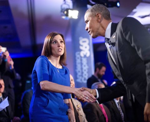 Obama walks over to greet Taya Kyle, widow of "American Sniper" Chris Kyle, during a commercial break. Earlier in the meeting, she told Obama that background checks give "almost a false sense of hope" and wouldn't have stopped many of the mass shootings we've witnessed. She also noted murder rates are down and maybe we should "celebrate where we are." After thanking Kyle for her husband's service, Obama agreed that crime was down overall, but said, "I challenge the notion that the reason for that is more gun ownership." He compared what he's trying to do to government efforts to make cars safer. "In the same way that we don't eliminate all traffic accidents but over the course of 20 years, traffic accidents get lower ... that's the same thing that we can do with gun ownership," Obama said.