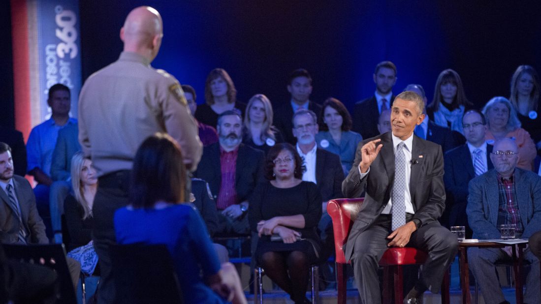 Obama answers a question from Paul Babeu, a sheriff in Arizona running for Congress. Babeu asked Obama what he's doing to prevent mass shootings, not target guns. Obama criticized the idea that "if we can't solve every crime, we shouldn't try to solve any crimes," which received applause from the audience. "The problem is in many instances, you don't know ahead of time who is going to be the criminal."