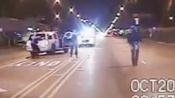 FILE - In this Oct. 20, 2014 frame from dash-cam video provided by the Chicago Police Department, Laquan McDonald, right, walks down the street moments before being shot by officer Jason Van Dyke 16 times in Chicago. Chicago officials released hundreds of emails Thursday Dec. 31, 2015 related to the video that wasn't released until more than a year after the shooting.  The emails, including some between city officials asking how they should respond to demands for the video, were released to media outlets that have been pressing for the documents for weeks.  (Chicago Police Department via AP, File)