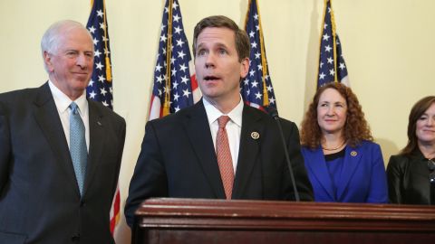 Rep. Mike Thompson (D-CA), Rep. Bob Dold (R-IL), Rep. Elizabeth Esty (D-CT) and Rep. Kathleen Rice (D-NY) hold a news conference about new legislation to enforce background checks for gun purchases in the Canon House Office Building on Capitol Hill March 4, 2015 in Washington, D.C.