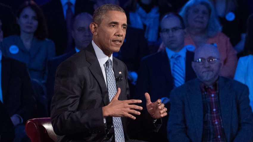 US President Barack Obama speaks at a town hall meeting with CNN's Anderson Cooper on reducing gun violence at George Mason University in Fairfax, Virginia, on January 7, 2016.