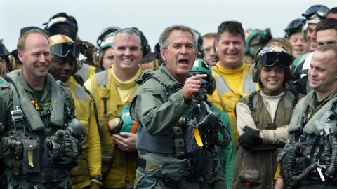 President George W. Bush displayed the "git 'er done" attitude on an aircraft carrier in 2003, where he declared "Mission Accomplished" in Iraq.