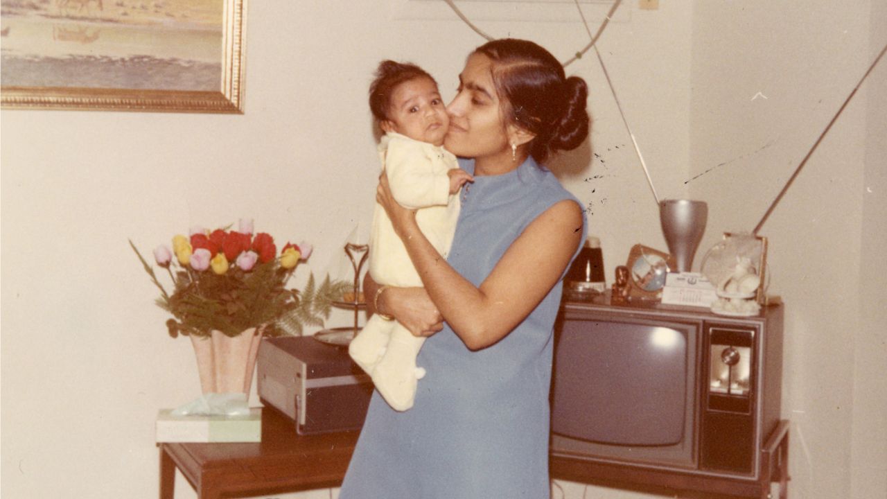 Damyanti Gupta holds baby Sanjay at their home in Dearborn, Michigan, in 1969.<br />"The word impossible was not allowed in the Gupta household. Never. Not with a mother like mine," he says now. 