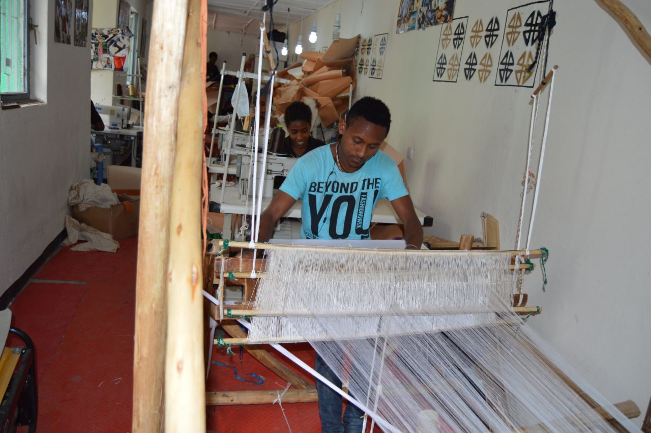 Weavers producing fabrics for Zaaf's bags. Schulze explains that as the brand grew so did local demand or her bags which she had initially marketed internationally. This prompted her to open a boutique in Addis Ababa.