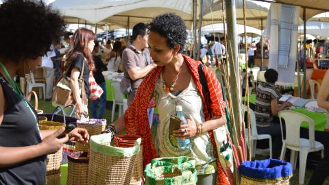 Writer and poet  Amira Ali, checks out the crafts at Anbar Marketplace