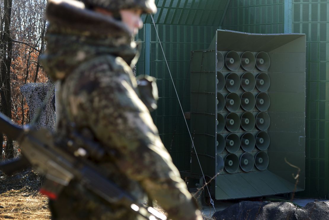 A South Korean soldier stands near the loudspeakers near the border area between South Korea and North Korea in Yeoncheon, South Korea, Friday.