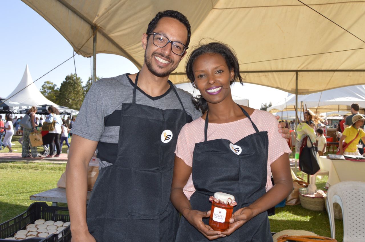 BHoney founders Selome Gedle Wasse and Gideon Abate. They keep their own bees then infuse the honey with natural ingredients such as ginger and orange.