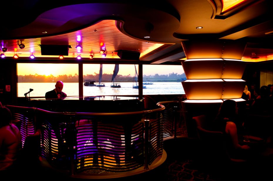 Planet Bar features a floor-to-ceiling audiovisual wall that displays some of the world's most striking settings, from fireworks above Sydney Harbour Bridge to a sunset above the Sahara Desert. 