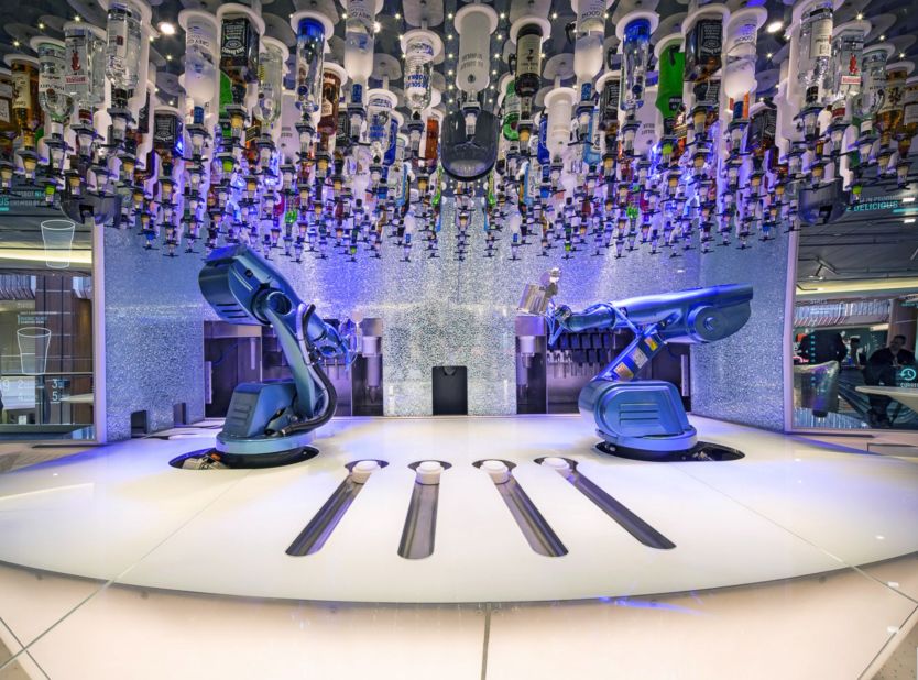 These two robotic bartenders are the main draw at Royal Caribbean's Bionic Bar. They can mix two drinks in one minute.